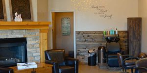 Salon bambino seating area and hair wash station in Woodbury